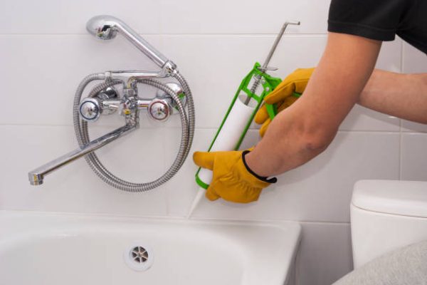 plumber apply silicone sealant to the joint bathtubs and ceramic tile plumber apply silicone sealant to the joint bathtubs and ceramic tile